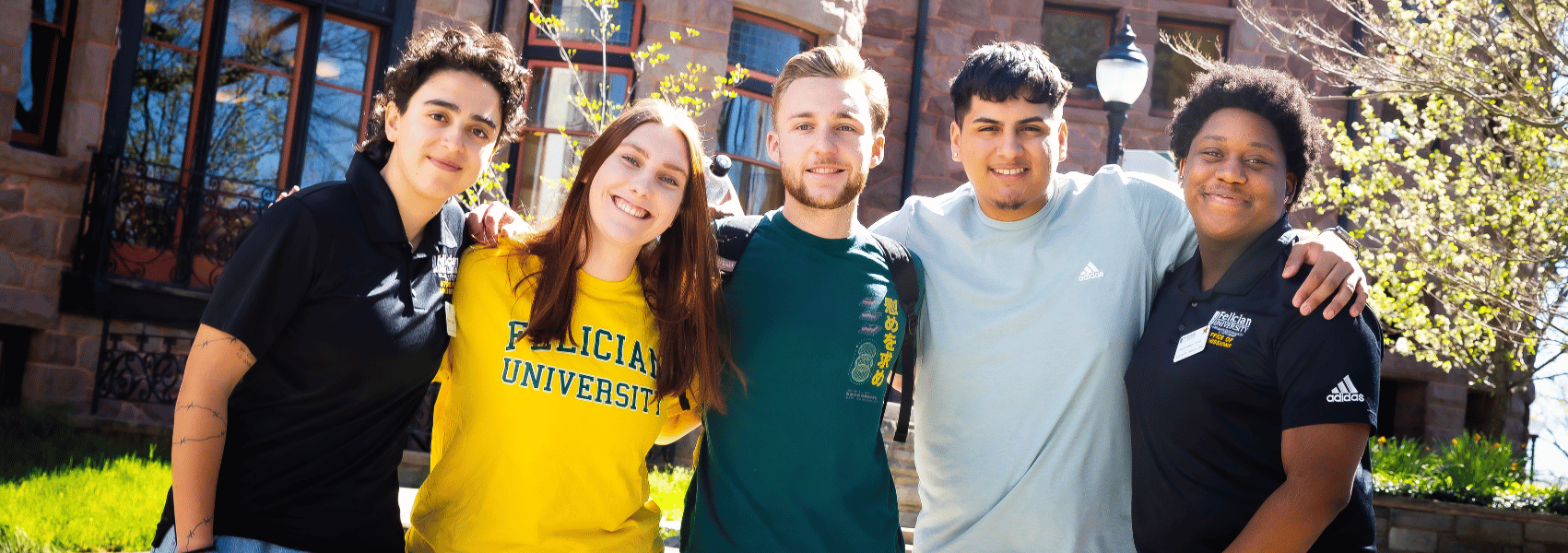 Group of students outside smiling