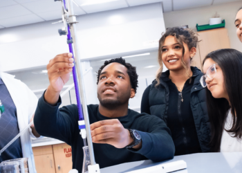 Student Interacting with diagram in front of peers and Instructor
