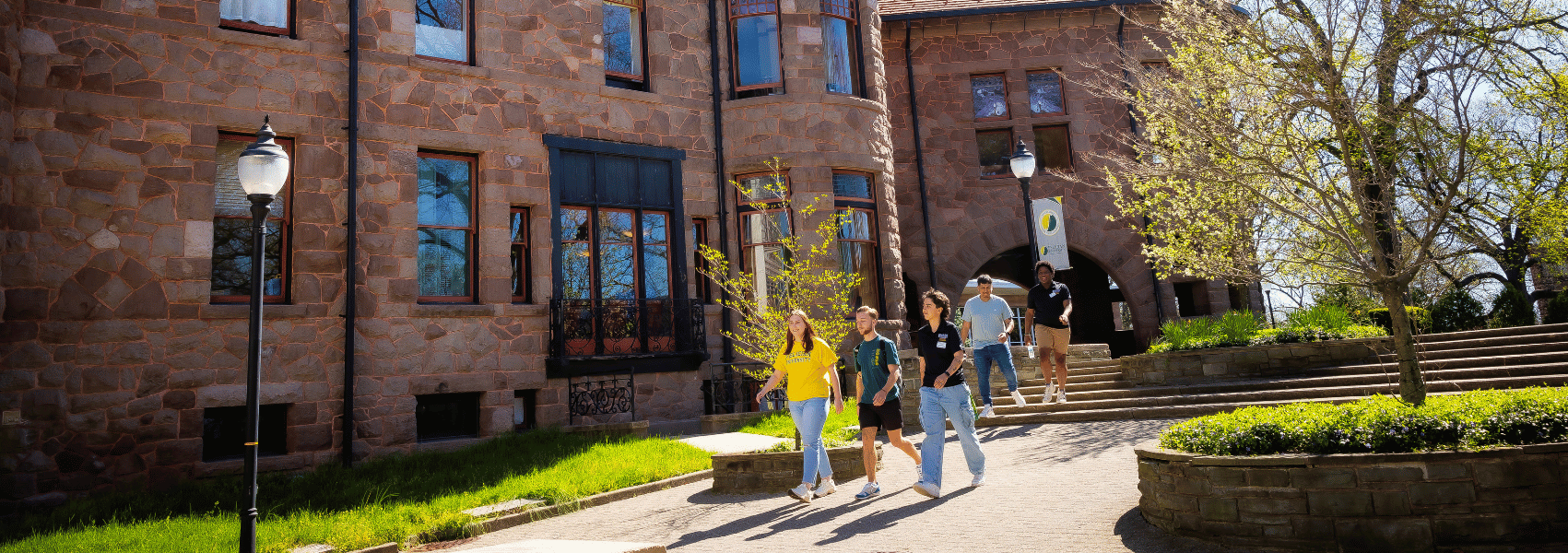 Students walking infant of castle on Rutherford