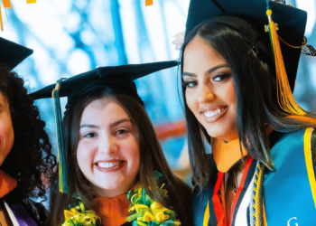 Three Female students in cap and gown