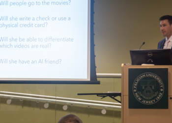 Karl Haviland speaking at podium