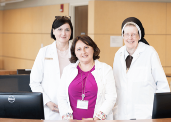 nursing staff and faculty in the nursing lab 1