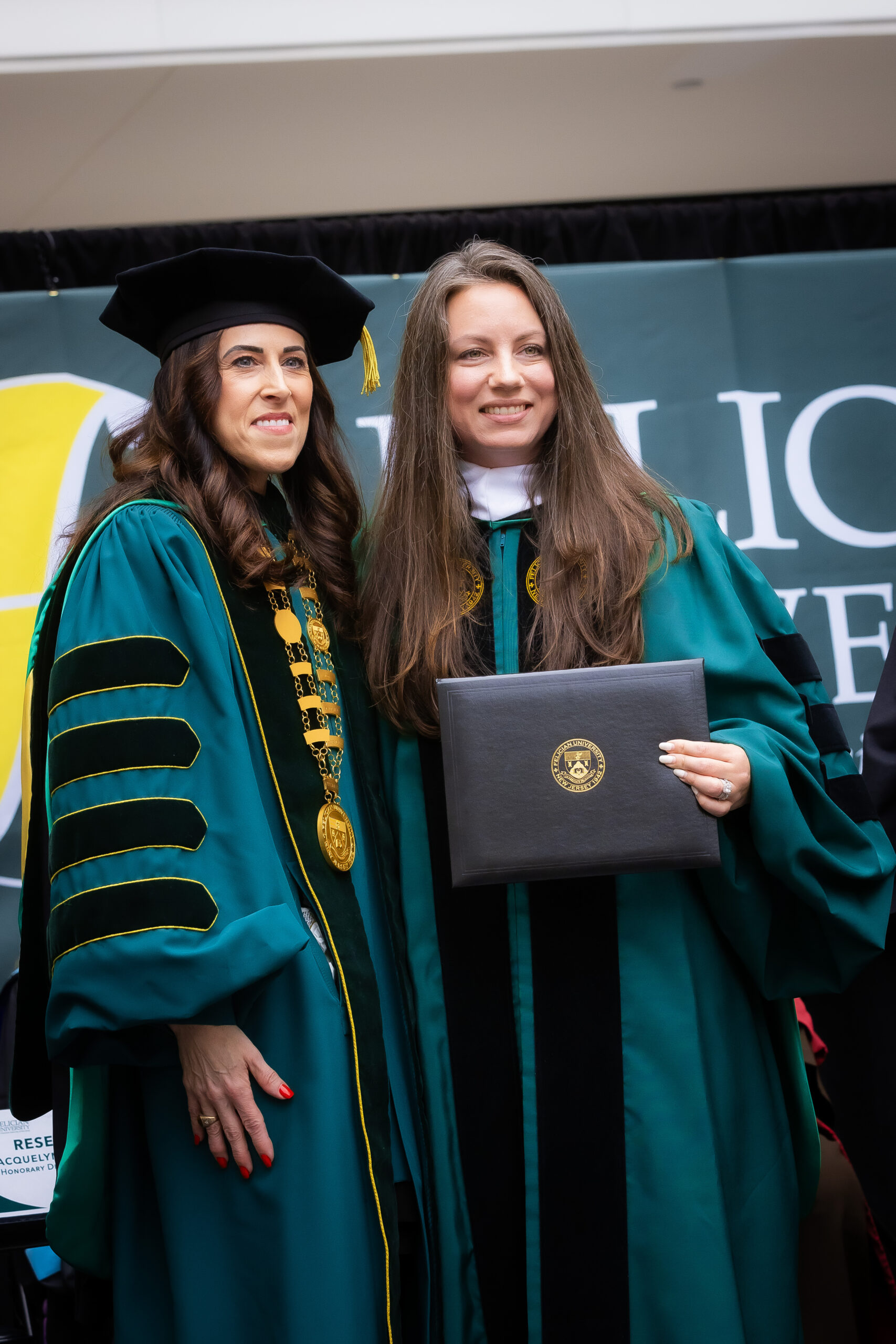 Felician University President Dr. Mildred A. Mihlon (left) with Commissioner Jacquelyn A. Suarez (right)