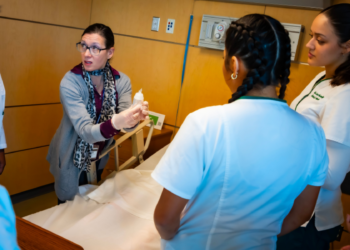 nursing students with professor