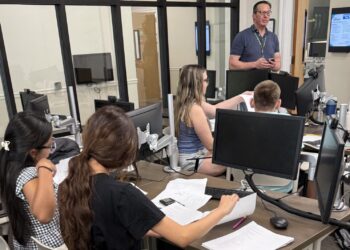 summer academy students in investing class